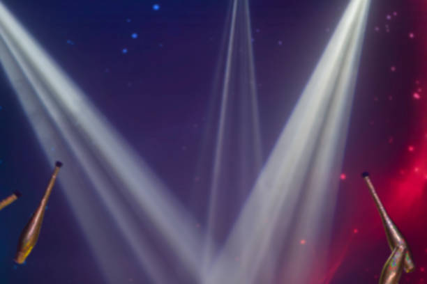 istock Scenic white rays from spotlights on a dark background. 1356977465