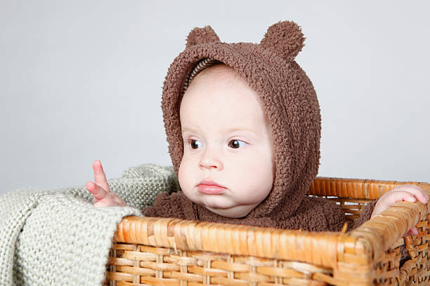 istock Baby boy in a basket 135697791