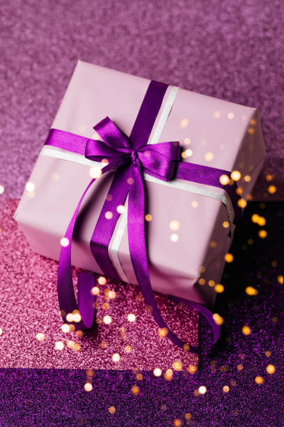 istock Lavender gift or present box with velvet bow 1356980773