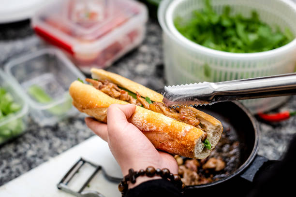 istock Making Vietnamese sandwiches banh mi 1356983190