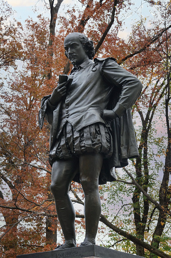 New York, NY - November 17, 2021:  Statue of William Shakespeare in Central Park, by J.Q.A. Ward (died 1910), erected 1870