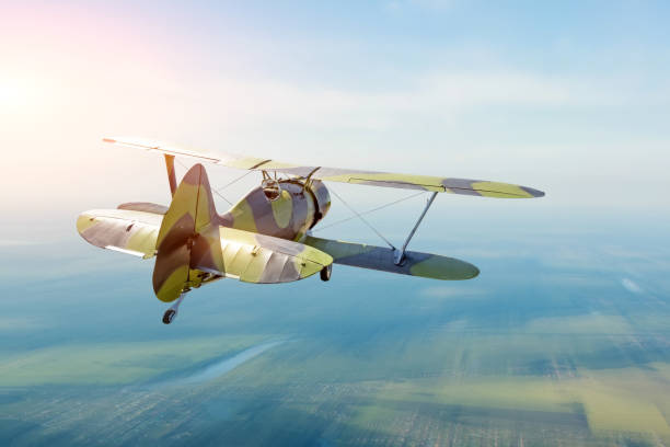 istock Vintage turboprop plane flying in the sky speed effect, back view 1356987623
