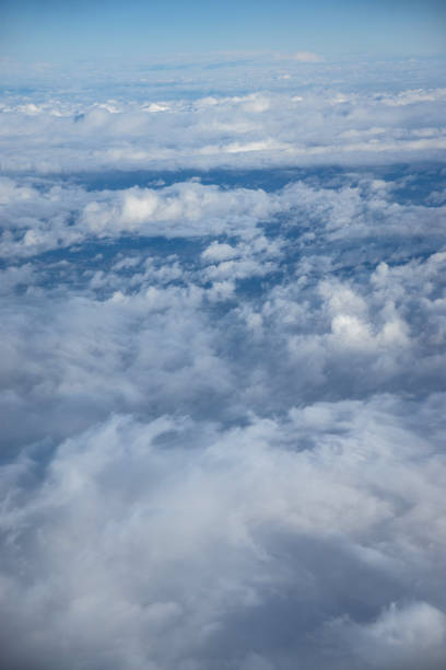istock Cloudcape made from window of airplane 1356991620