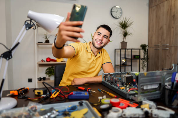 istock Young electrician taking a selfie 1356992178