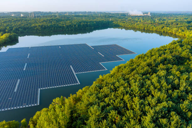 istock Aerial view of environmentally friendly energy with floating solar panels platform system on the lake 1356993010