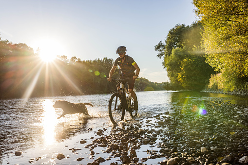 Bredannaz, France - 16 August 2022: Looking at part of the cycle path that circumnavigates Lake Annecy. The cycleway along the west shore is traffic free.