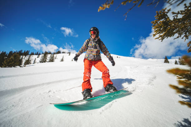 istock Snowboarder in mountains 1356999103