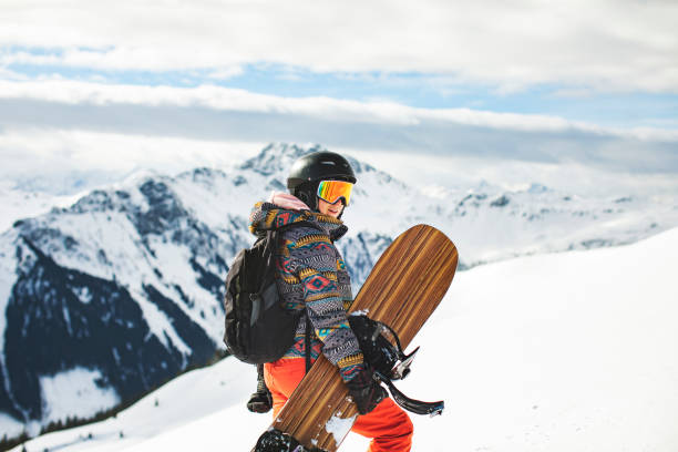 istock Snowboarder in mountains 1356999116