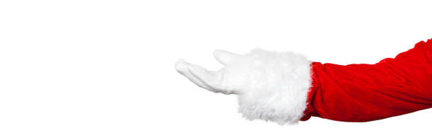 istock Santa Claus presents something with his open hand 1356999387