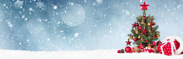 istock Christmas Tree with decoration on a winter background. 1356999754