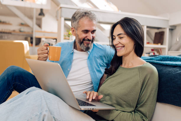 istock Mature couple working online together 1357001770