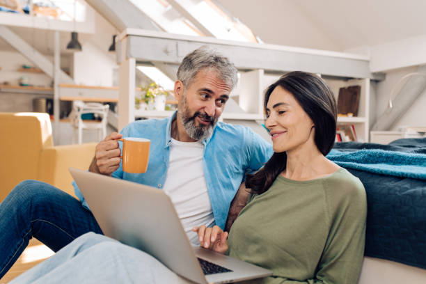 istock Mature couple working online together 1357001778