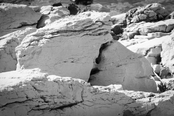 istock Limestone rocks by the shore 1357004169
