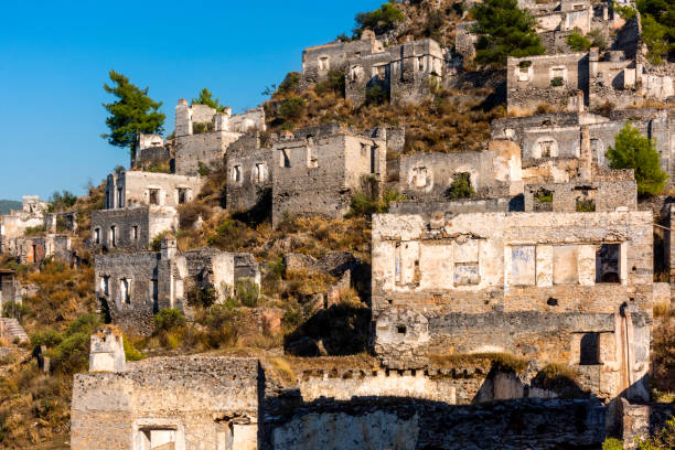 istock Abandoned Kayakoy (Levissi Village, Karmylassos) stone houses 1357005473