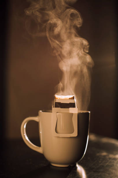 istock drip coffee bag in a mug , coffee concept 1357007819