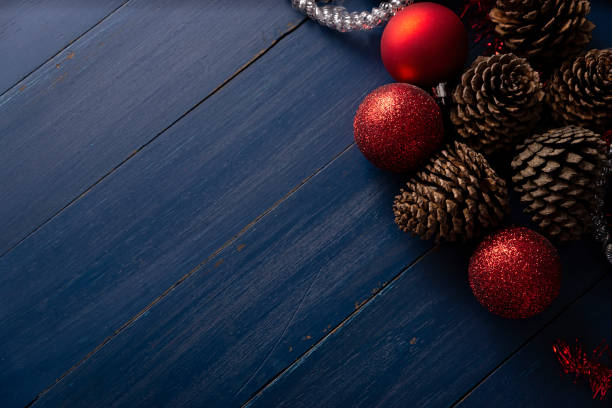 istock christmas decoration on blue wood 1357011038