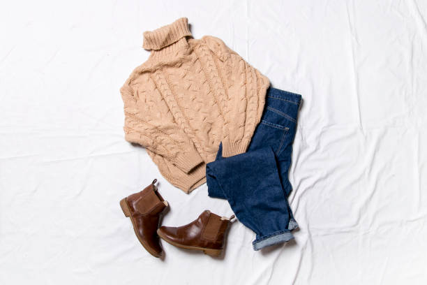 istock winter clothes on a white background, cozy winter 1357013299