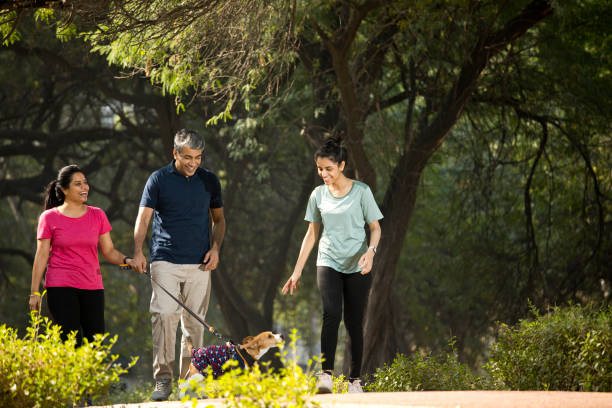 Happy family walking at park