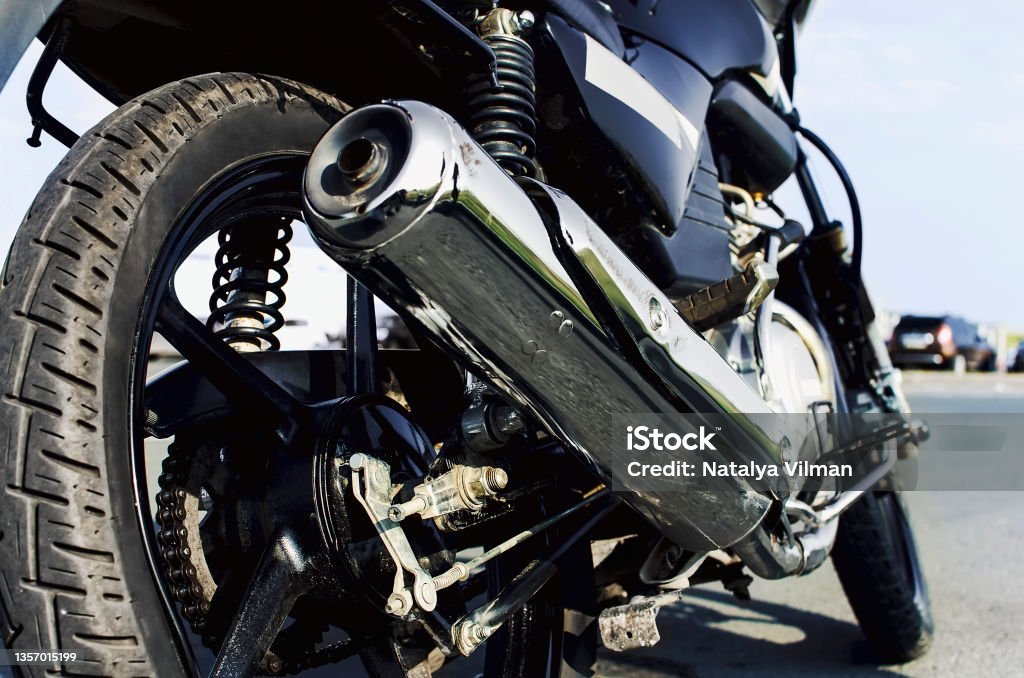 Exhaust pipe of a motorcycle. Close-up, selective focus. Motorcycle Stock Photo