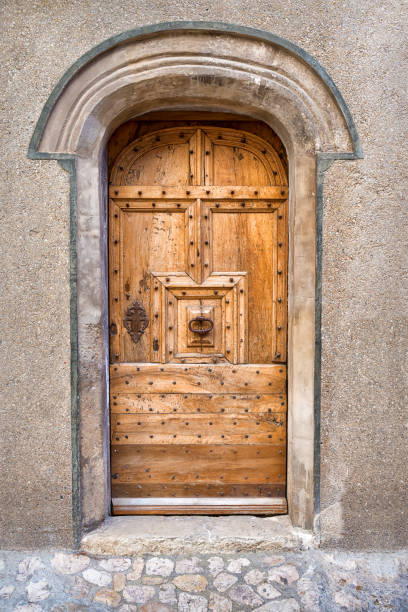 ancient medieval door facade, southern France