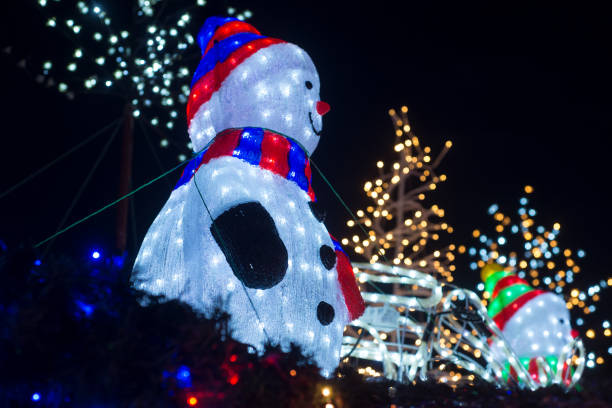 istock illumined snowman in the christmas decorative background 1357016430