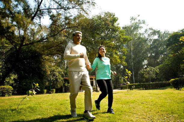 istock Indian couple running at park 1357018731