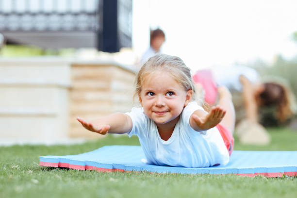 Happy girl during corrective gymnastics