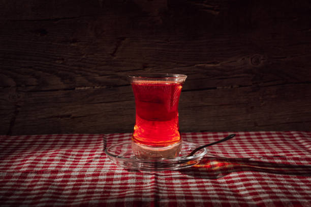 istock Turkish black tea on the table inside traditional Turkish tea cup 1357022342