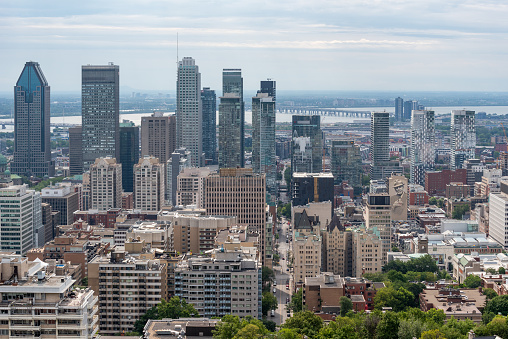 Montreal, Quebec, Canada – 14 August 2021 – View of the Montreal city downtown from the belvedere Kondiaronk of the Mont Royal park.