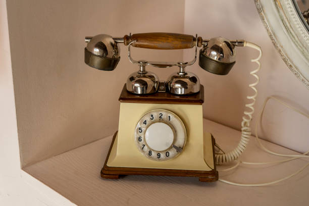 istock Old vintage telephone on table communication contact connection concept 1357030197