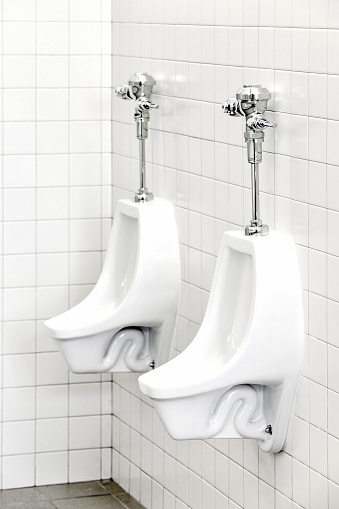 Urinals in a modern public men's room