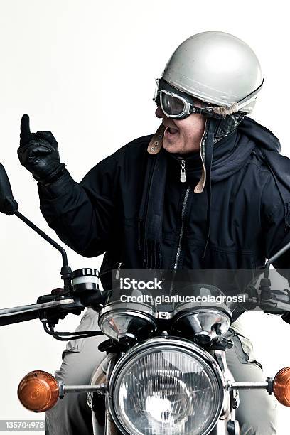 Man Drive His Motorcycle With Helmet And Glasses Stock Photo - Download Image Now - Helmet, Motorcycle, Old-fashioned