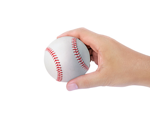 Baseball in hand on white background