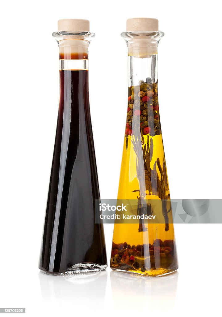 Olive oil and vinegar bottles Olive oil and vinegar bottles. Isolated on white background Balsamic Vinegar Stock Photo