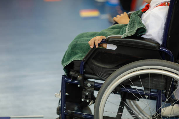 istock Ill disabled young boy in a wheelchair. 1357057064