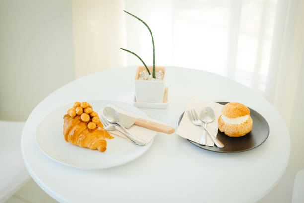 istock Dessert Croissant and Choux Cream menu served on white table coffee shop 1357063876