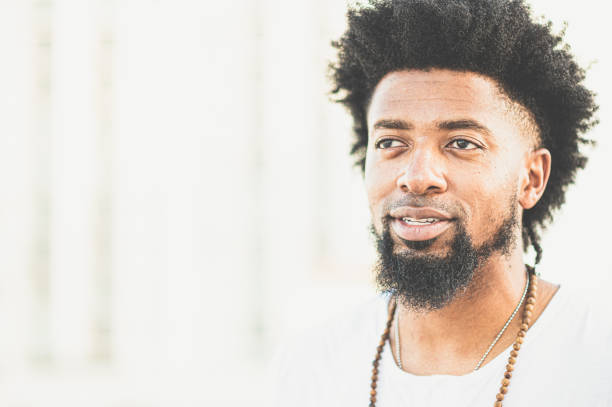 istock Handsome young black man in candid portrait 1357065676