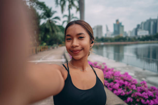 istock Female athlete taking selfie after workout 1357068267