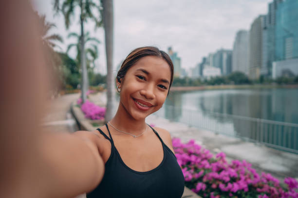 istock Female athlete taking selfie after workout 1357068268