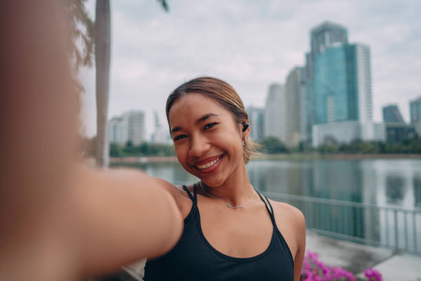 istock Female athlete taking selfie after workout 1357068269