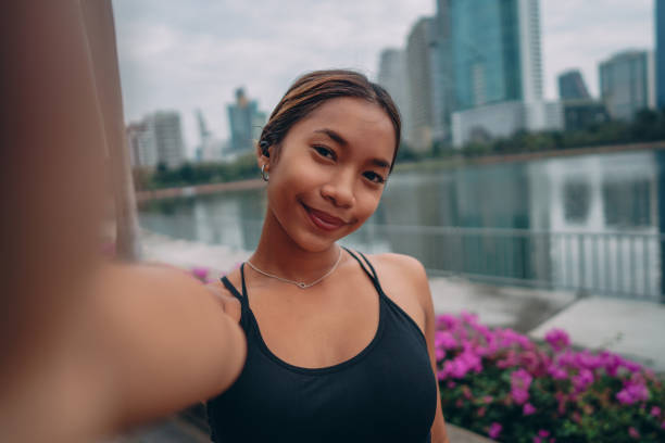 istock Female athlete taking selfie after workout 1357068274