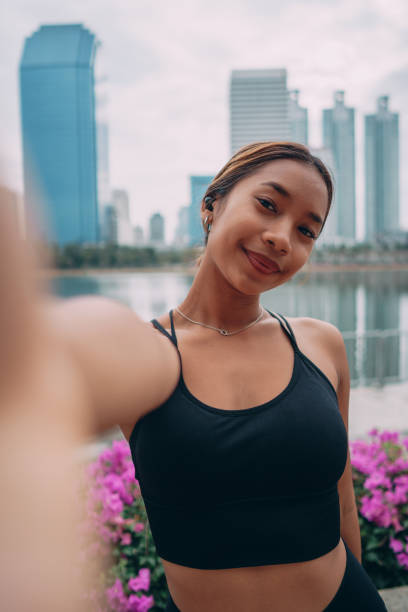 Female athlete taking selfie after workout