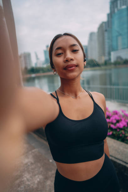 istock Female athlete taking selfie after workout 1357068279
