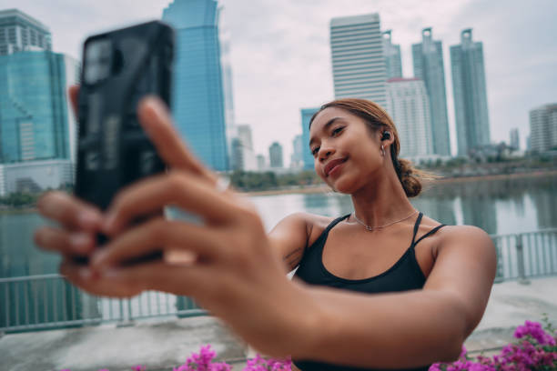 istock Female athlete taking selfie after workout 1357068280