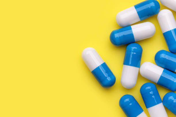 istock Medicines in capsules. Wallpaper, backgrounds and texture. 1357077580