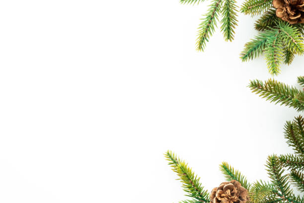istock White table with Christmas decoration including pine branches and pine cones. Merry Christmas and happy new year concept. Top view with copy space, flat lay. 1357080254