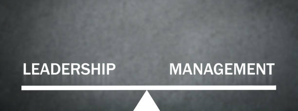 istock Leadership and Management balance scale. 1357080364