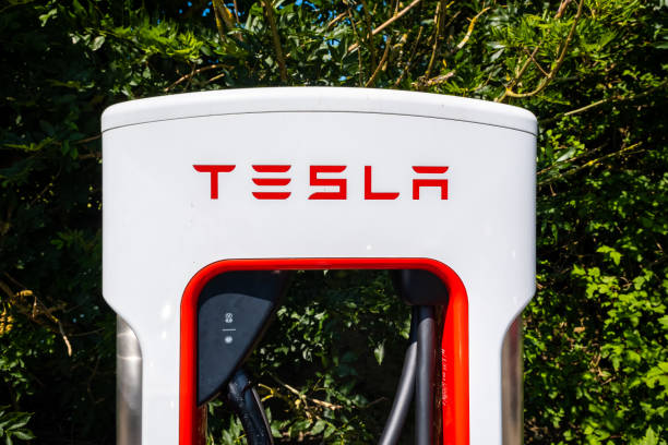 Close up of a Tesla Electric Vehicle, Super Charging point stock photo
