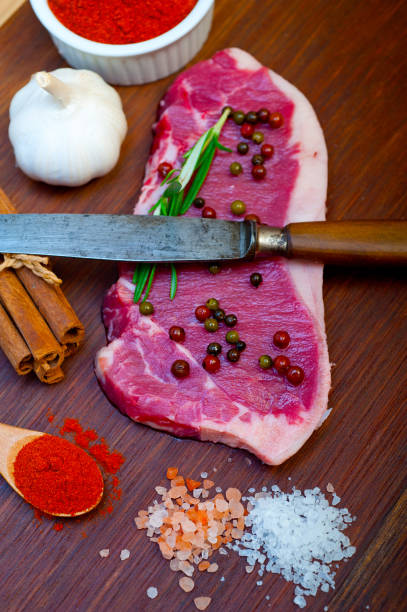 istock raw uncooked  ribeye beef steak butcher selection 1357082345