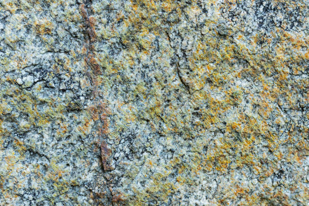 istock Granite texture. Rough granite surface stone crystal natural surface. Natural stone granite background. Copy space 1357084634